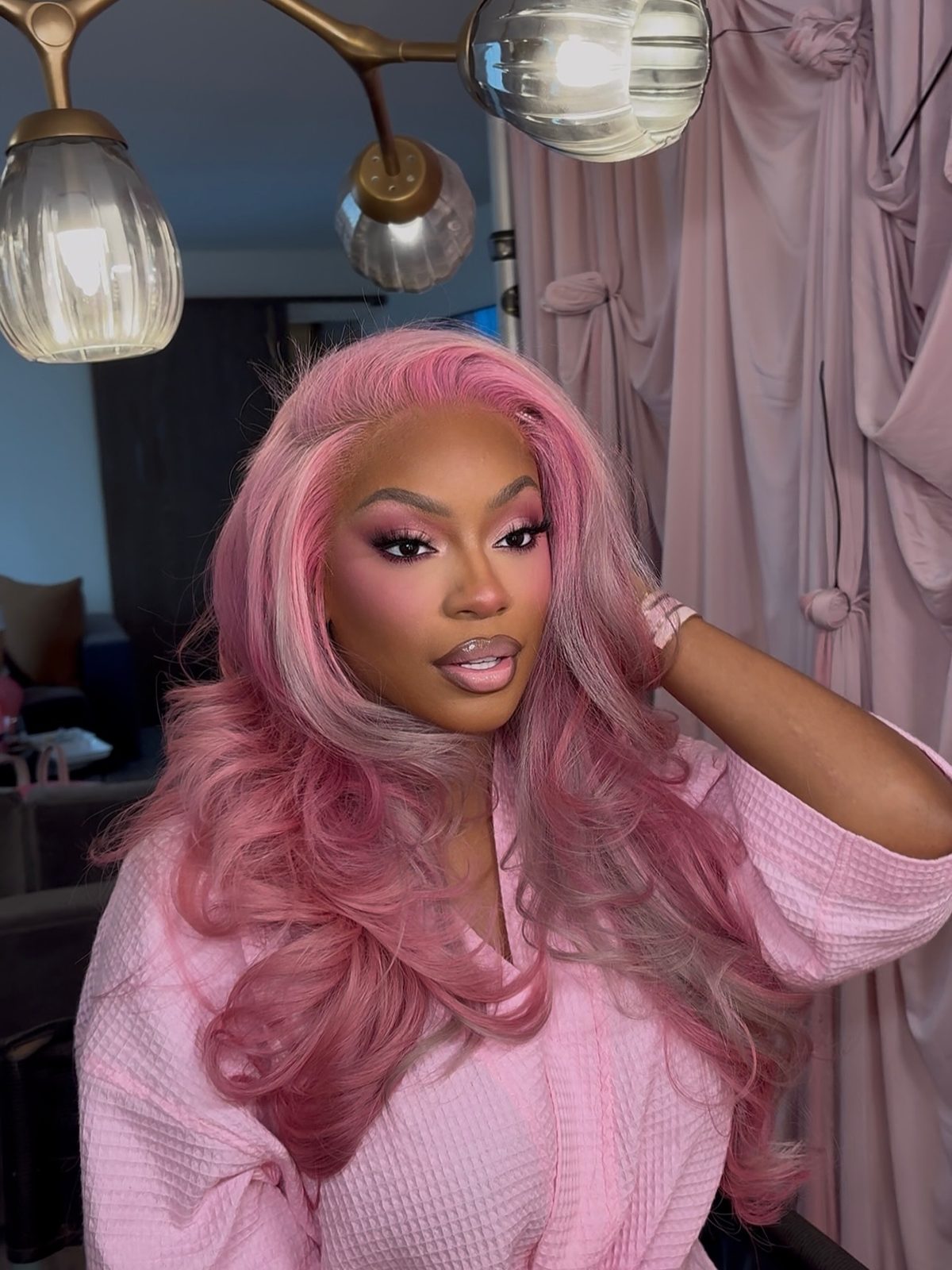 Soft pink makeup look with pink hair, from the Instagram feed